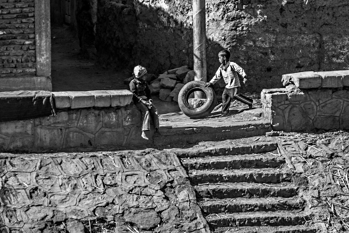 life along the Nile -- playing with a tire...