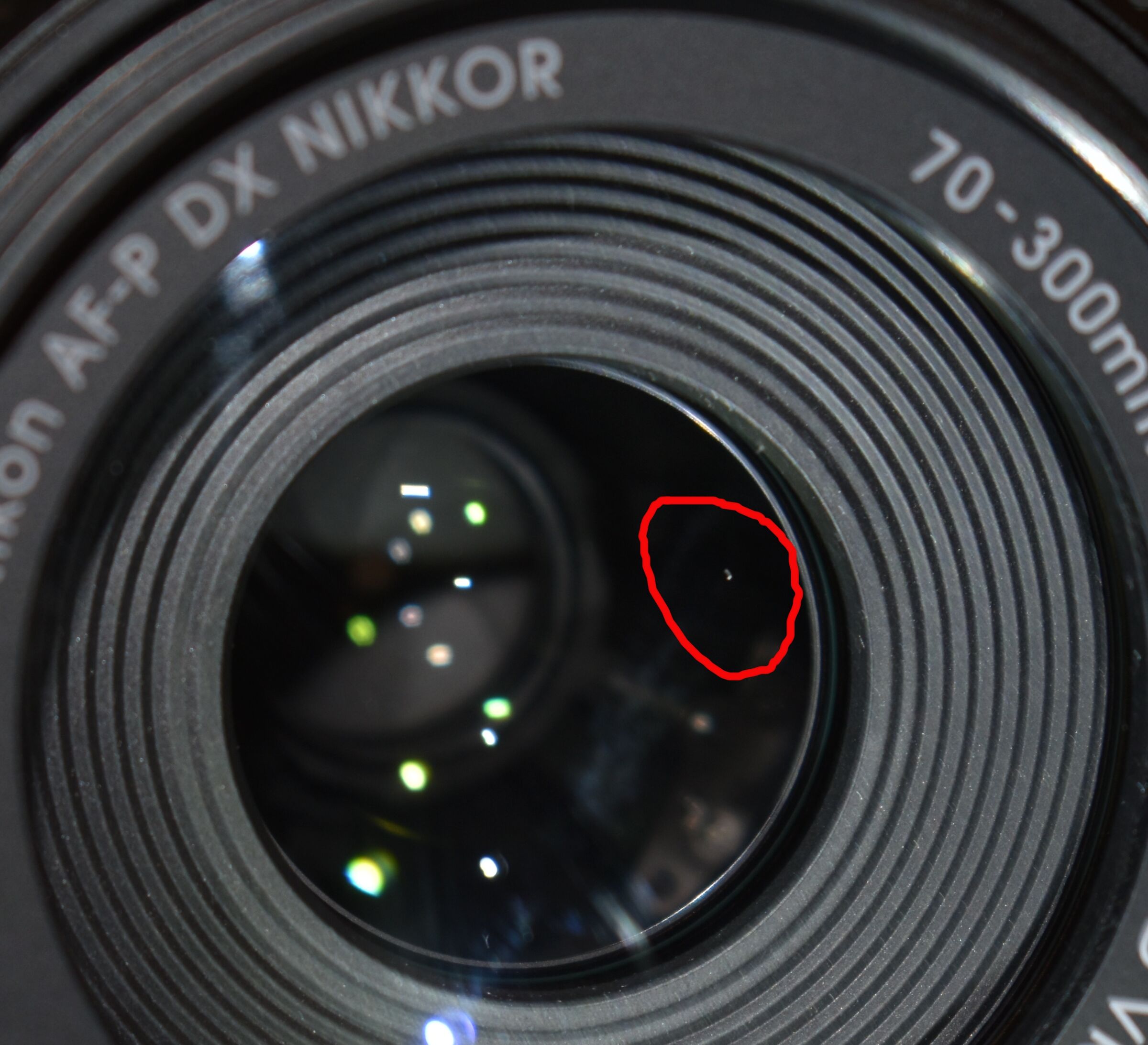 Nikon 70  300  bolla d'aria nella lente...