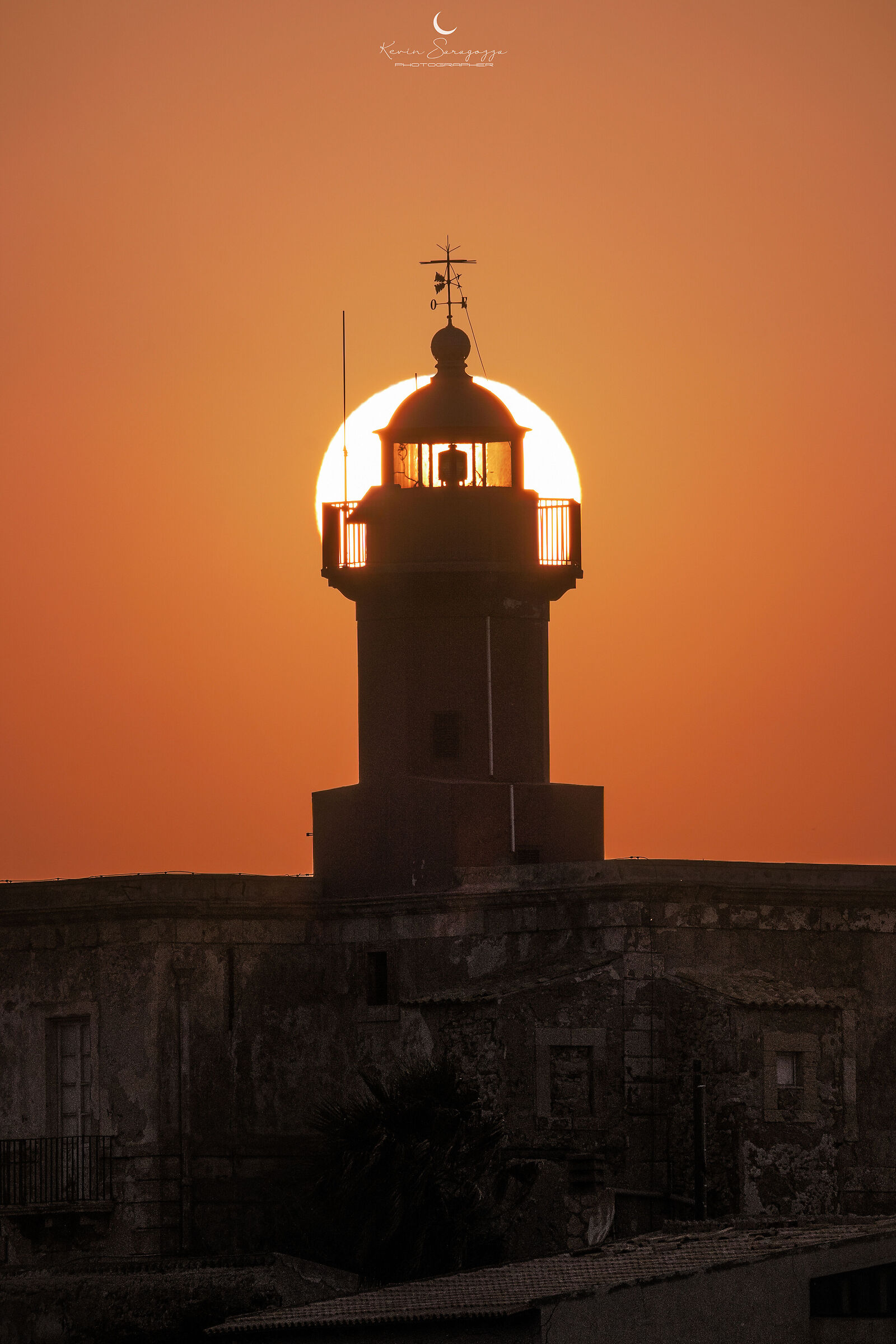 Syracuse sunset behind the Massolivieri lighthouse...