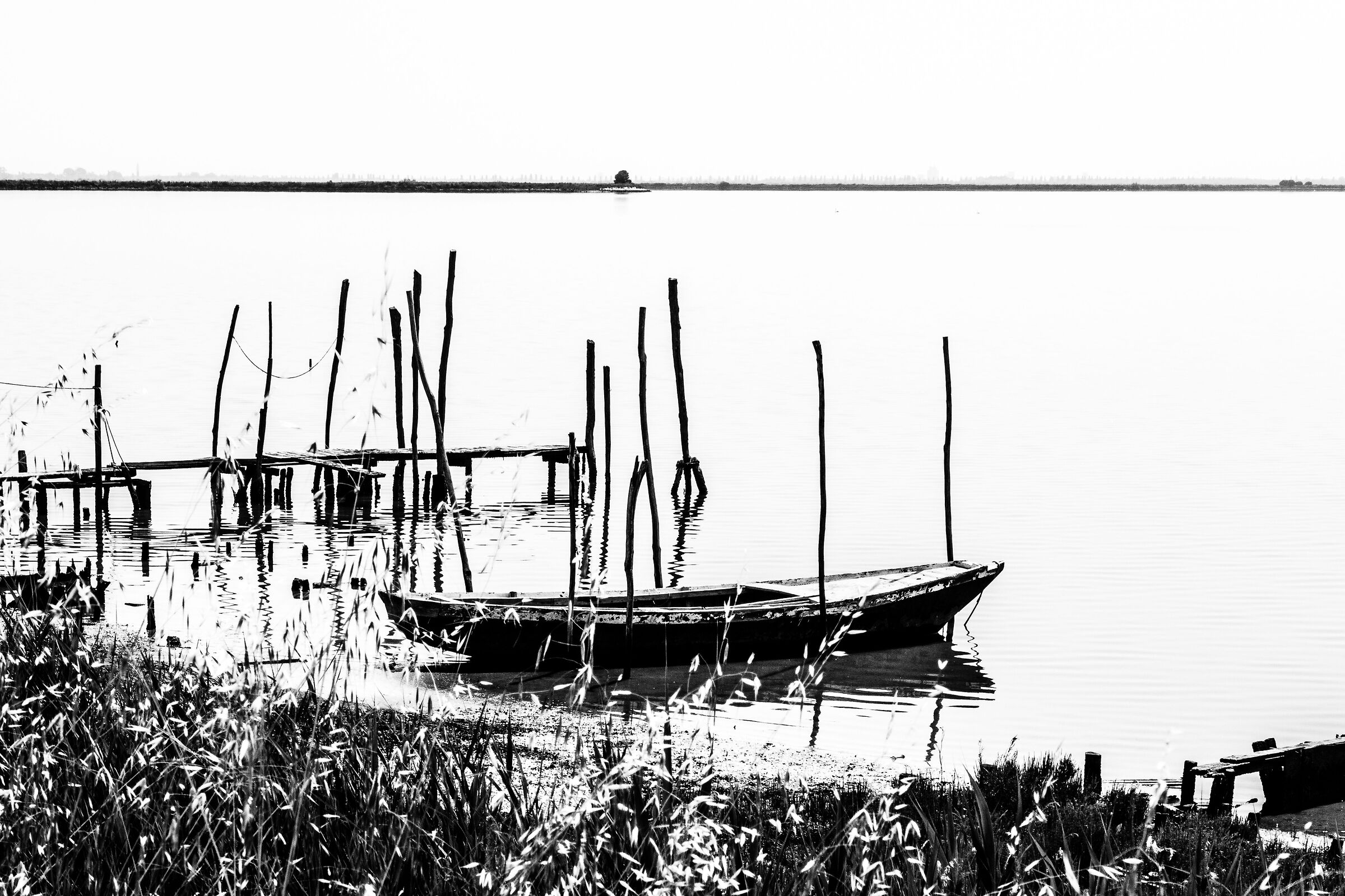 Lagoon with boat in Caposile...
