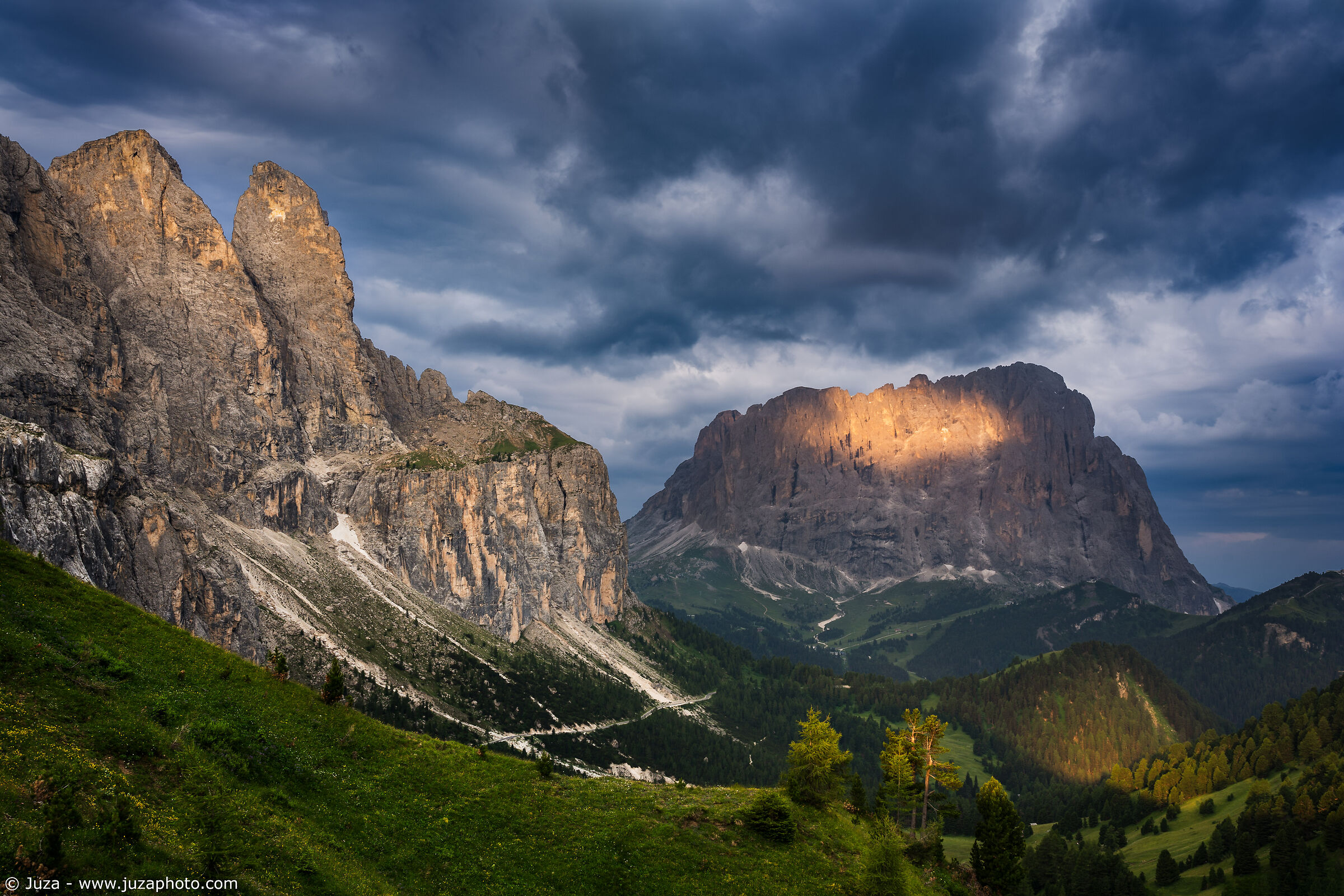 Sunrise and clouds at Passo Gardena...