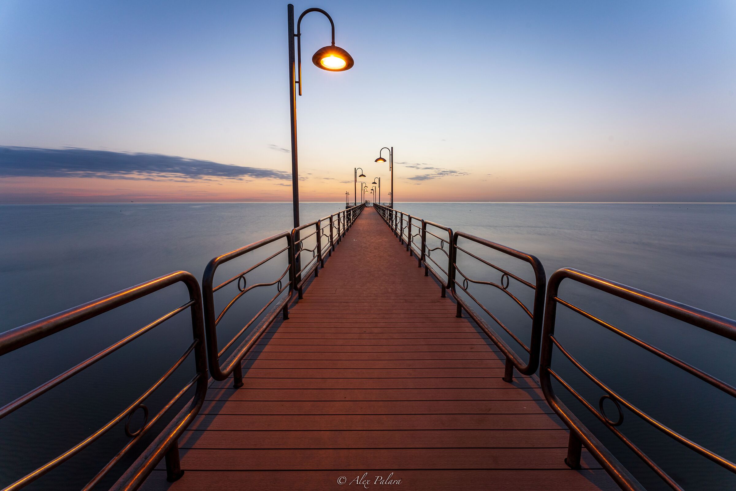 Sunrise on the pier of Vasto...