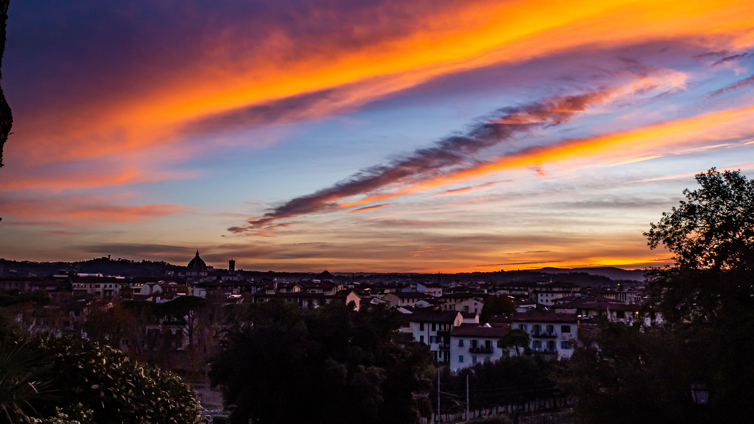 Fiery clouds in a sunset over Florence...