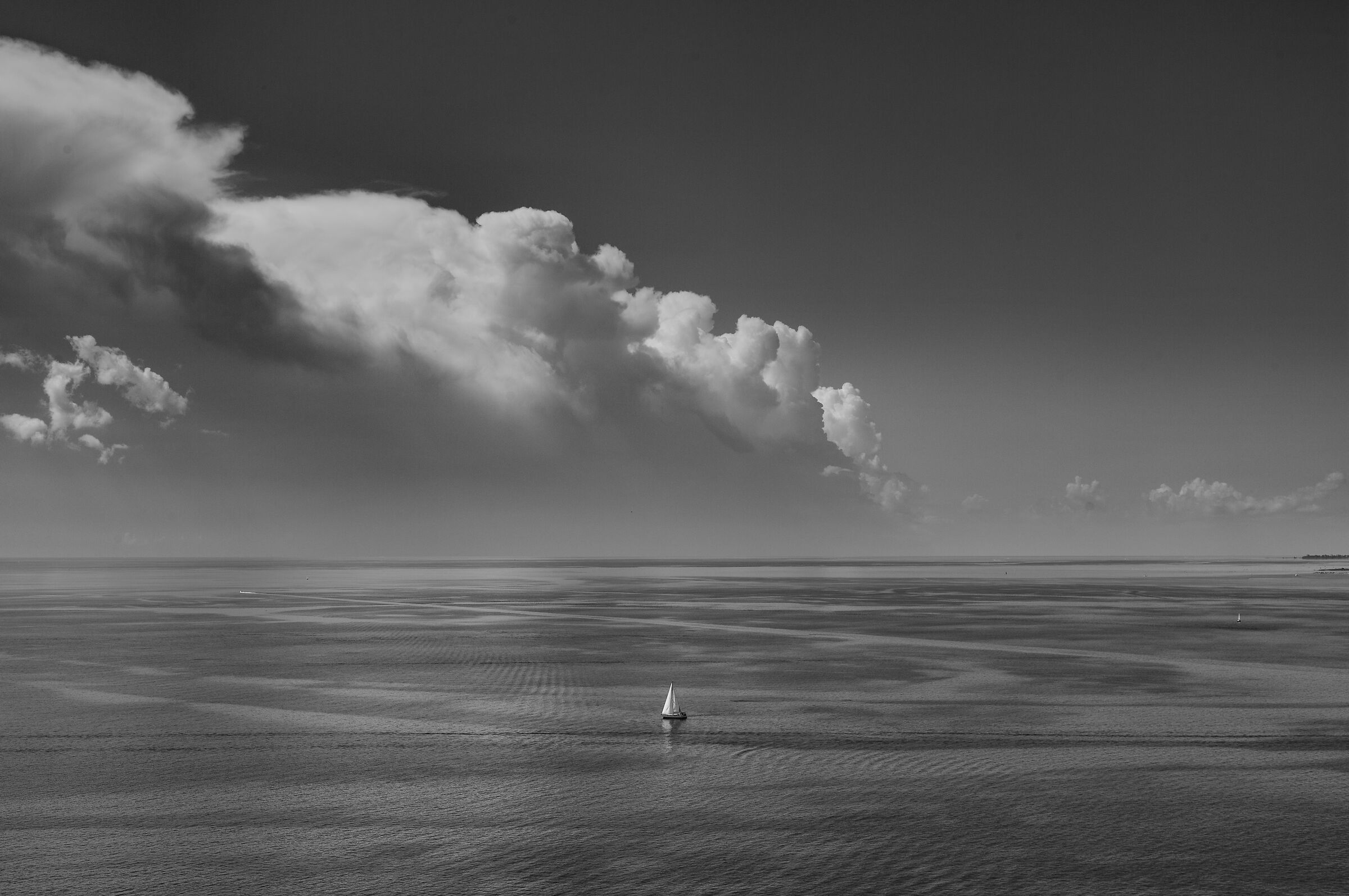 A small boat in the middle of the sea, Trst....
