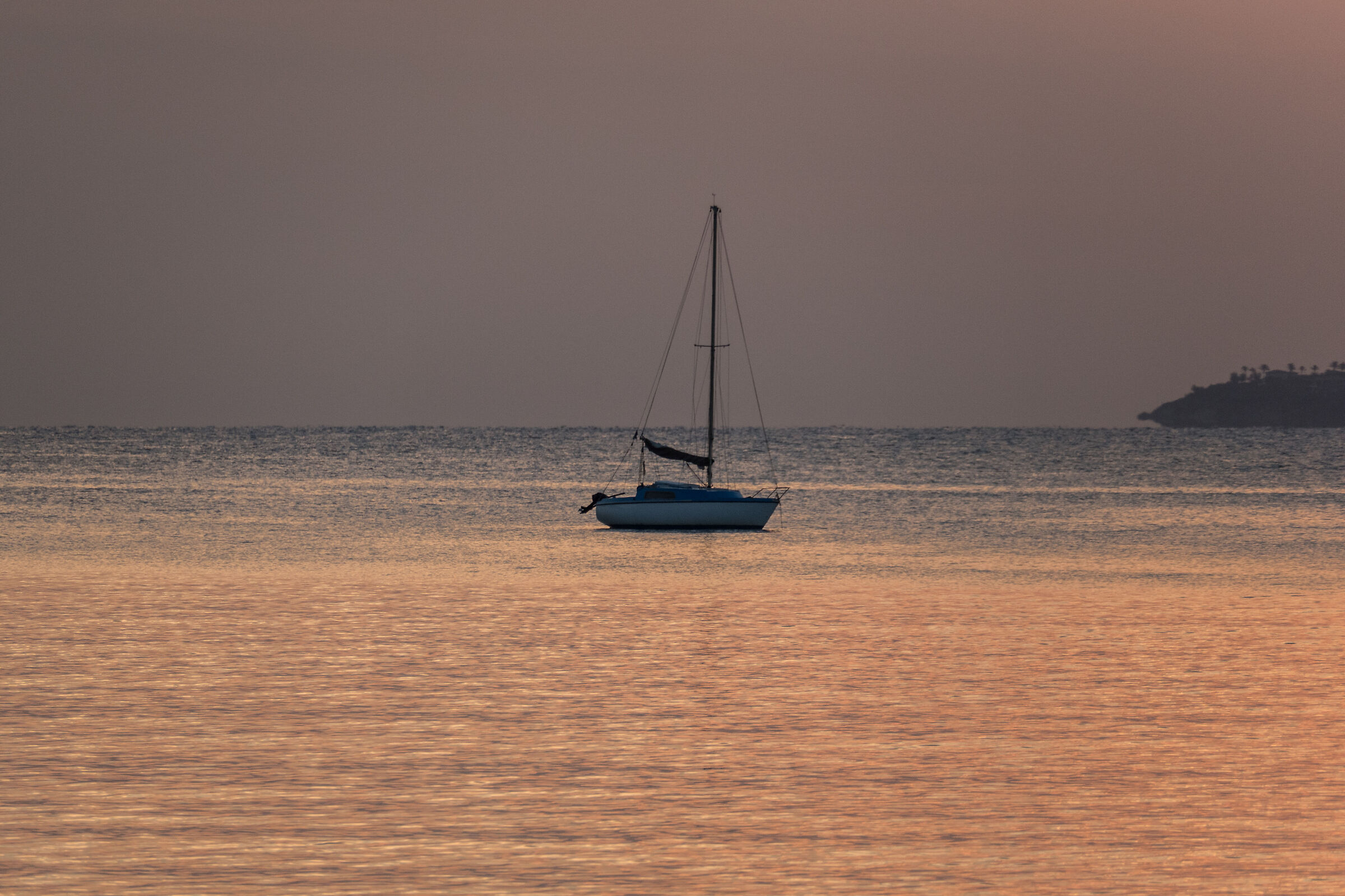 Boat at dawn in the sea of Port Grimaud...