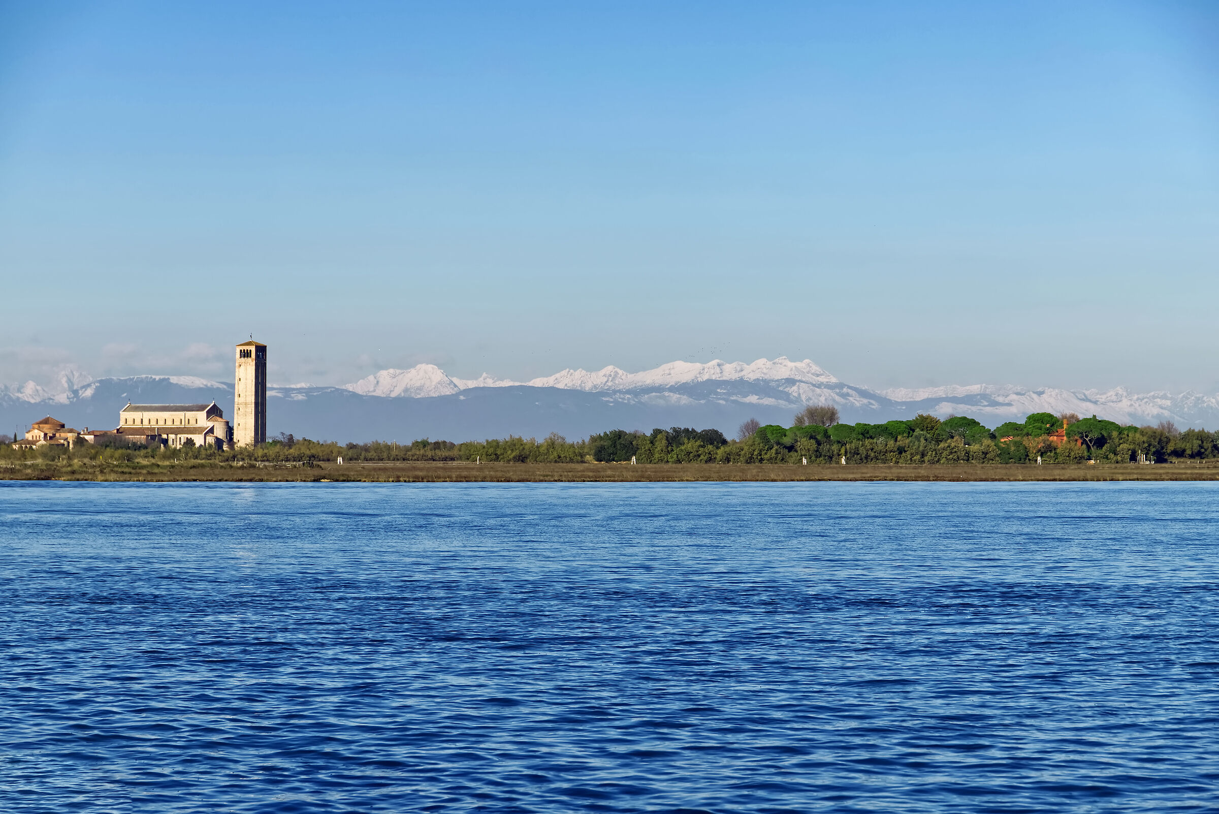 view of torcello island and Prealps from Burano...