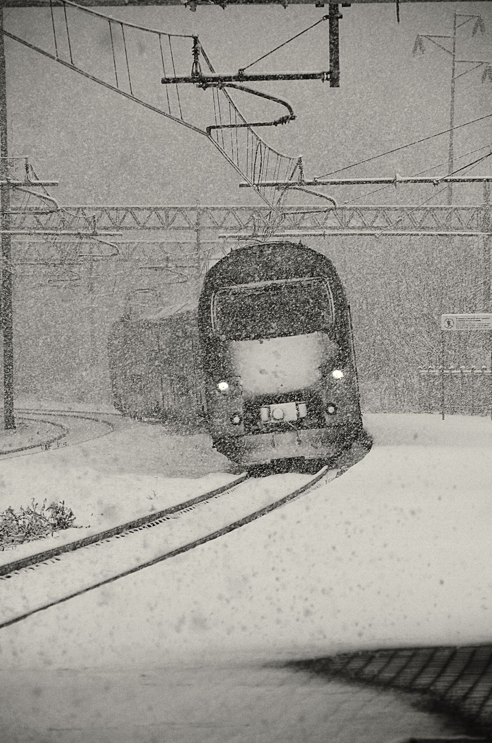 Under the snow the train arrives ......