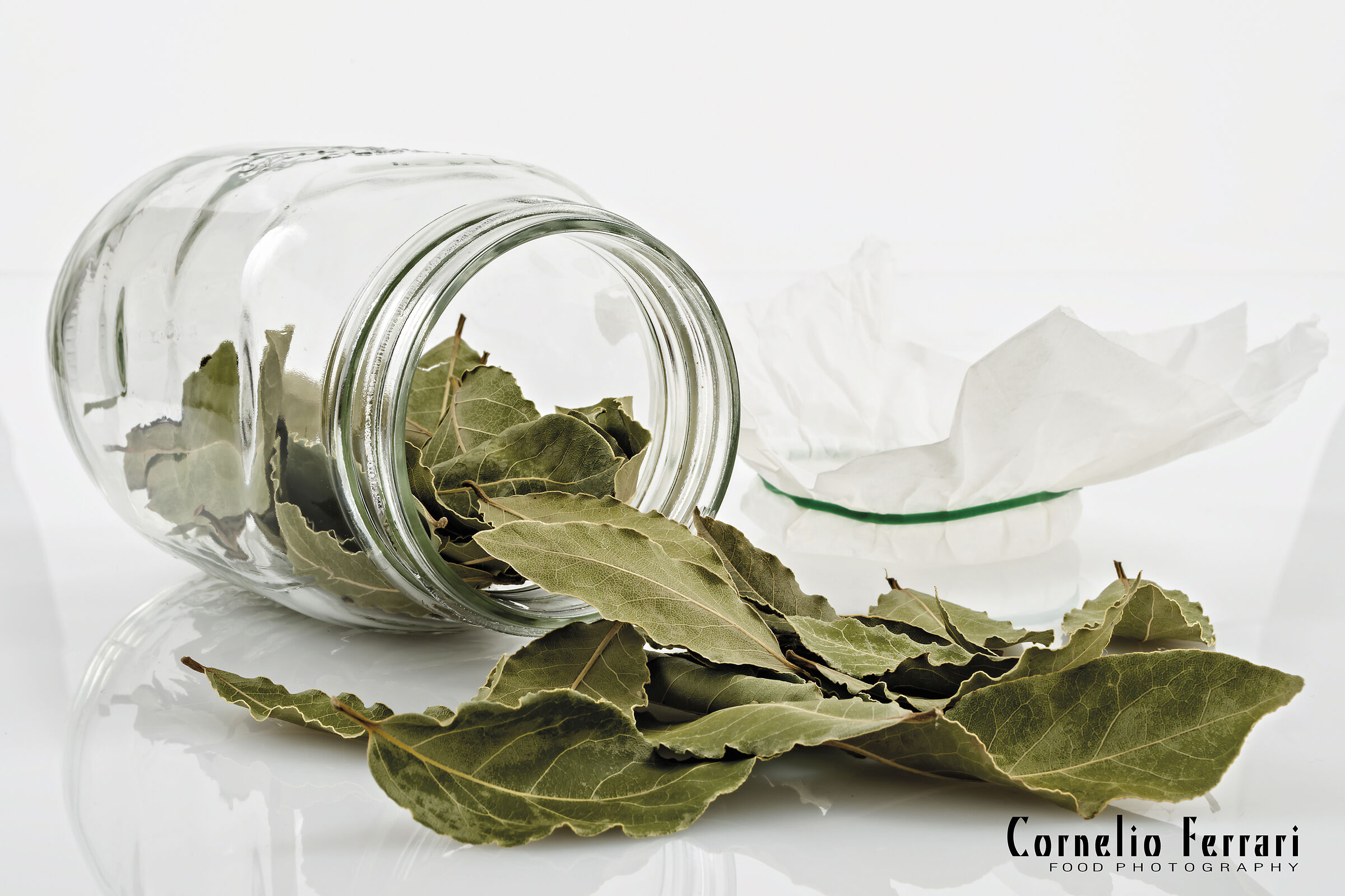 laurel dry leaves in inverted glass jar...