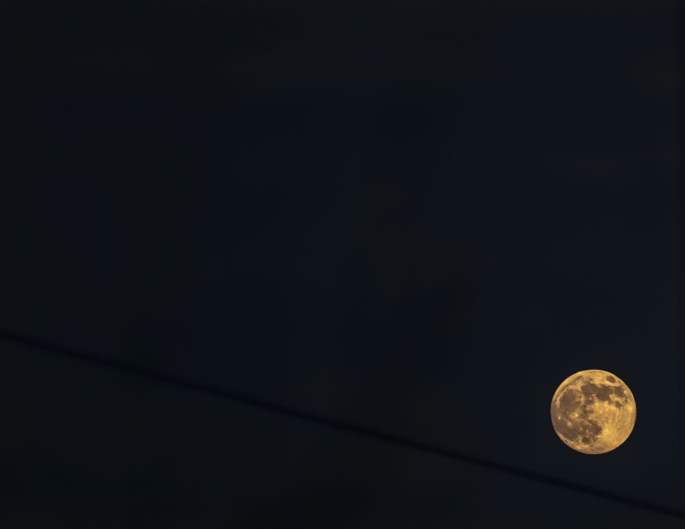 Moon on wire...