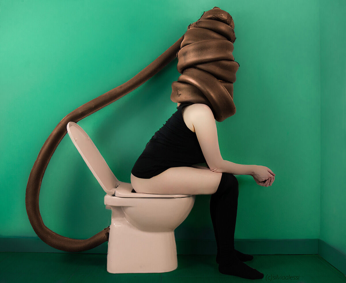 The act of defecation, photo taken from a series ...