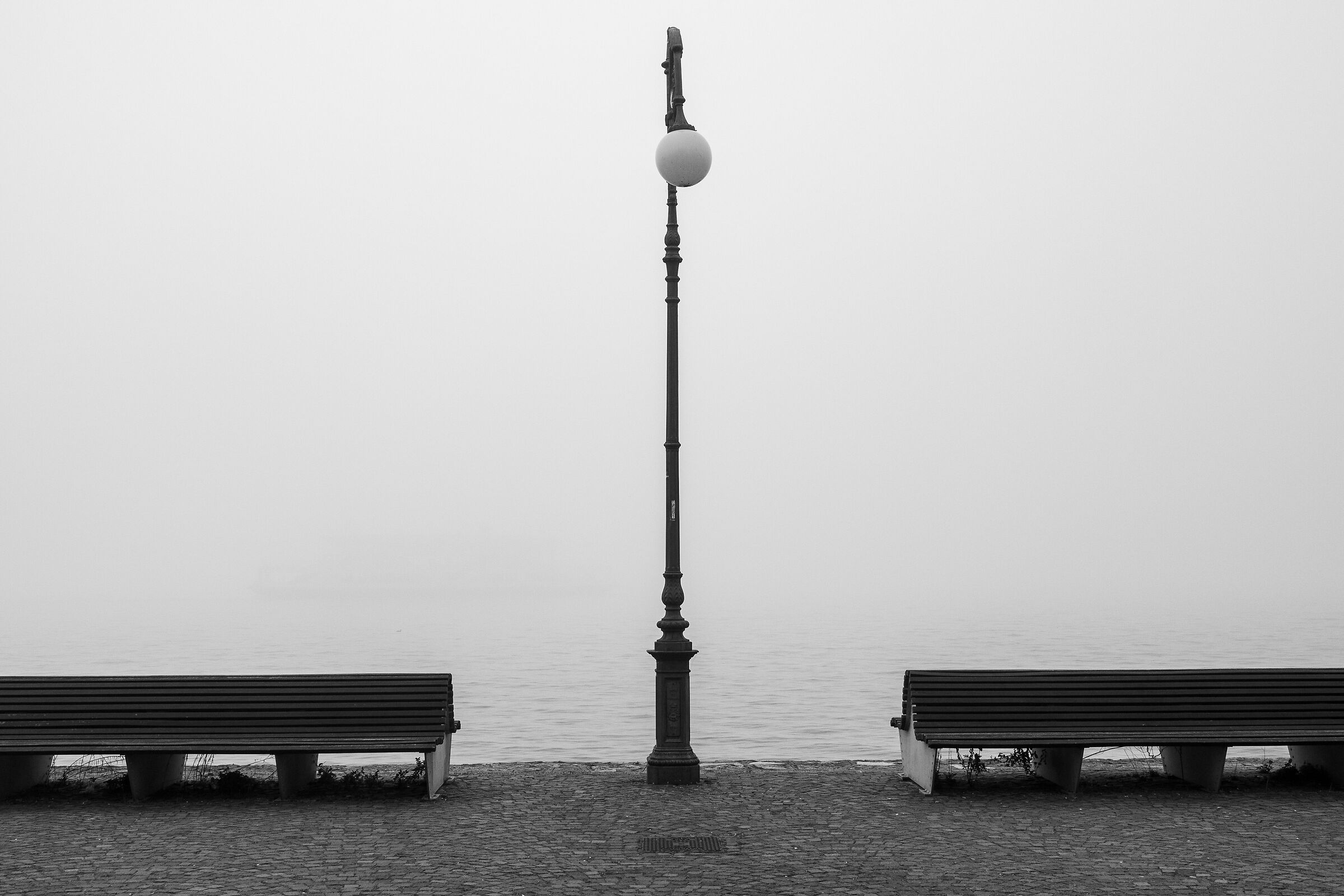 Lakeside promenade of Verbania Intra on a foggy morning...