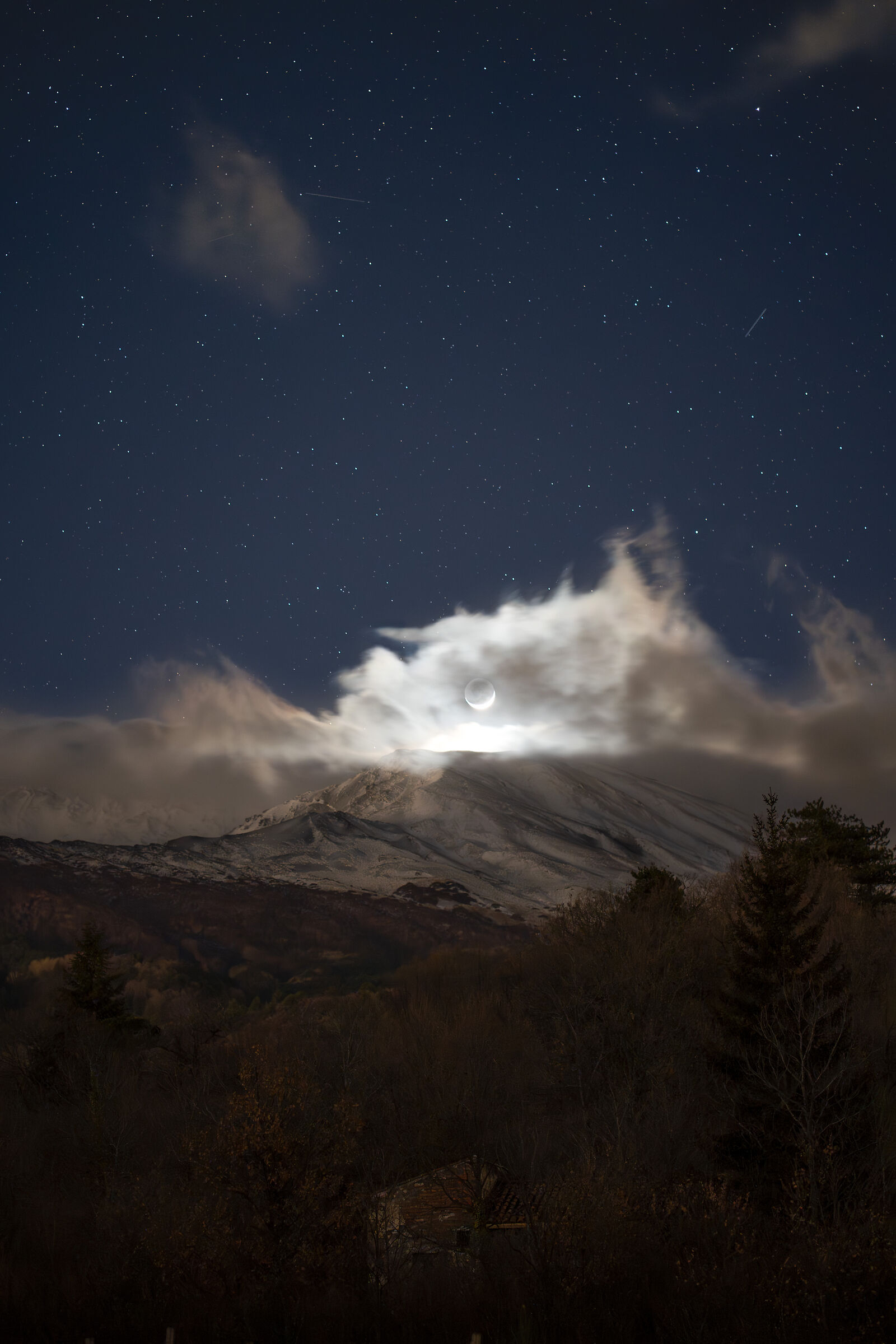 Crescent moon on Mount Etna...