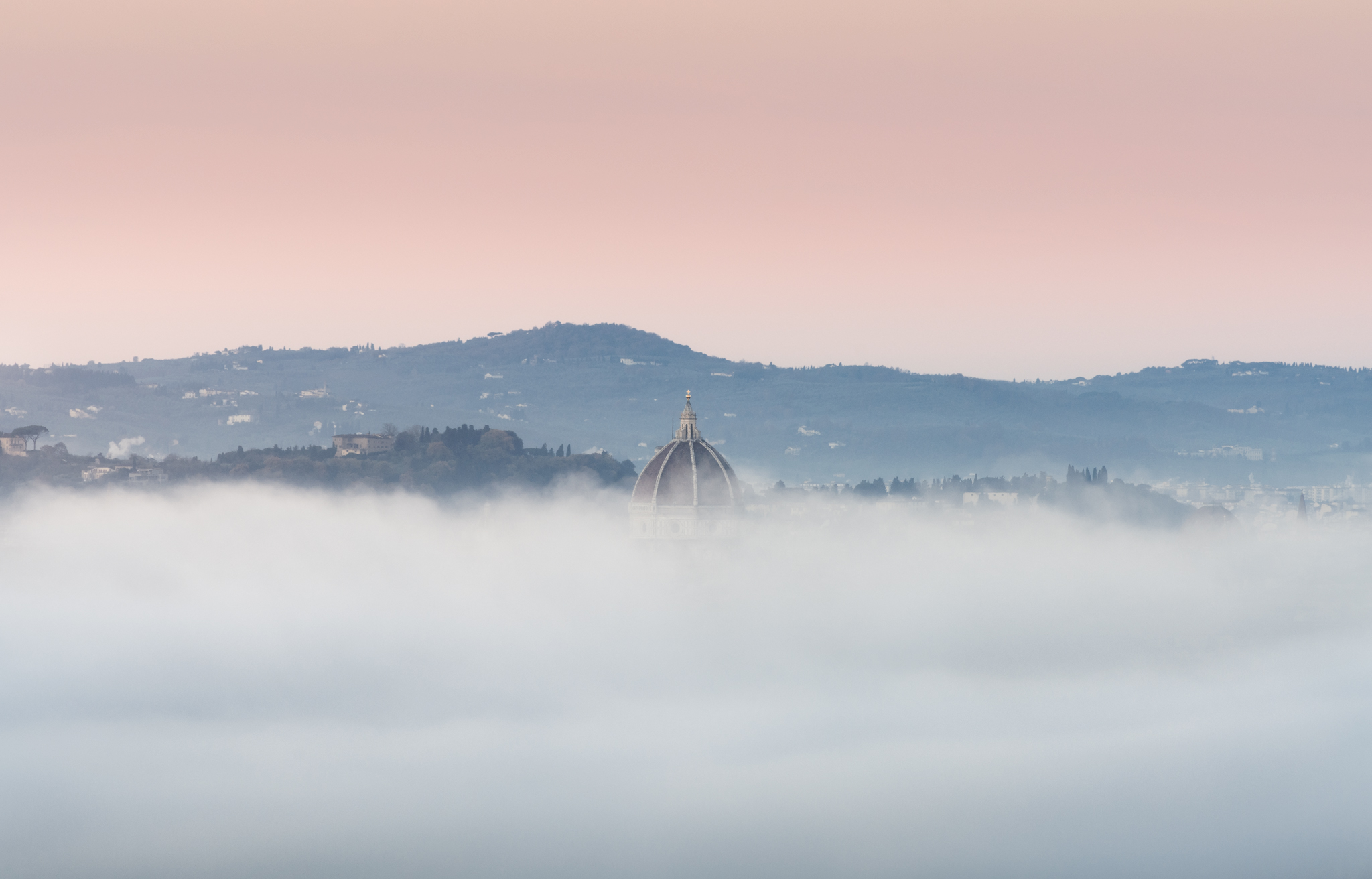 The Duomo comes out of the fog...