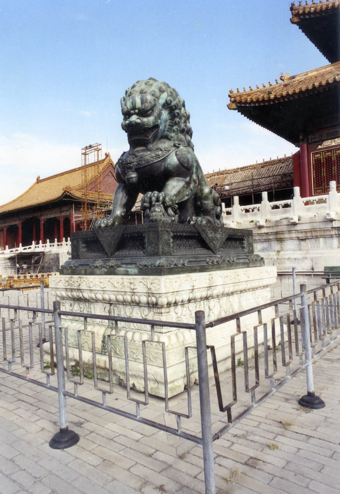 One of the many bronze statues of the forbidden city. ...
