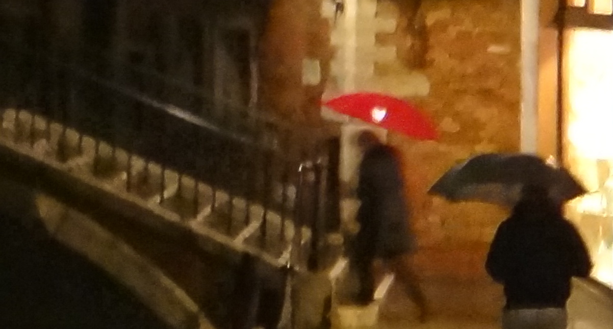 Heart-shaped reflection on the umbrella...