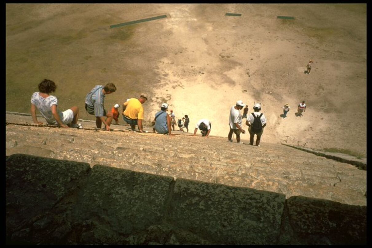 Tourists on Mayan pyramid in Cancun...